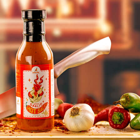 Immerse yourself in the bold embrace of Markhor's Spicy Garlic Sauce.